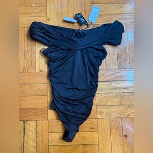 “Express” body contour bodysuit;